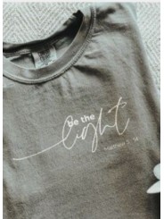 be the light T shirt