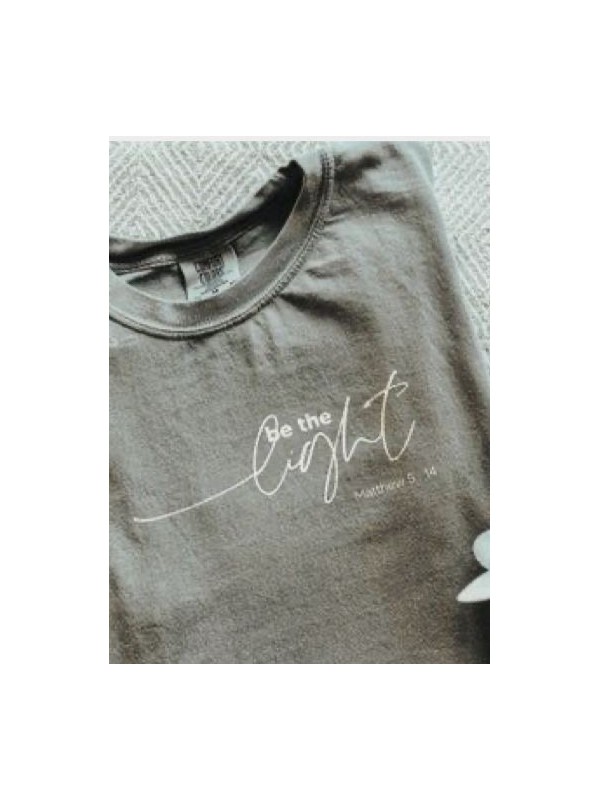 be the light T shirt